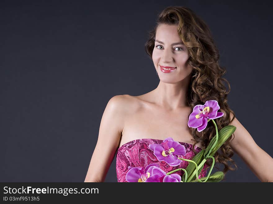 Beautiful young woman with long wavy hair