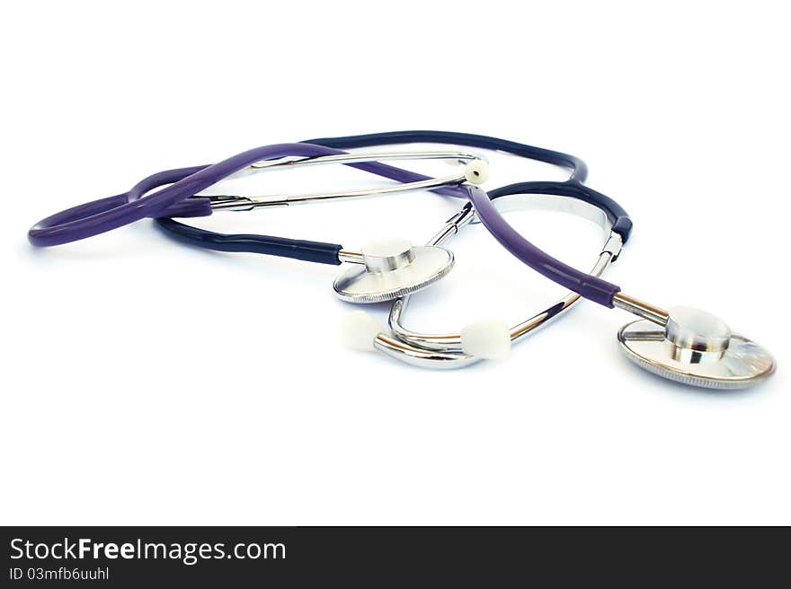 Two phonendoscopes  on white background.