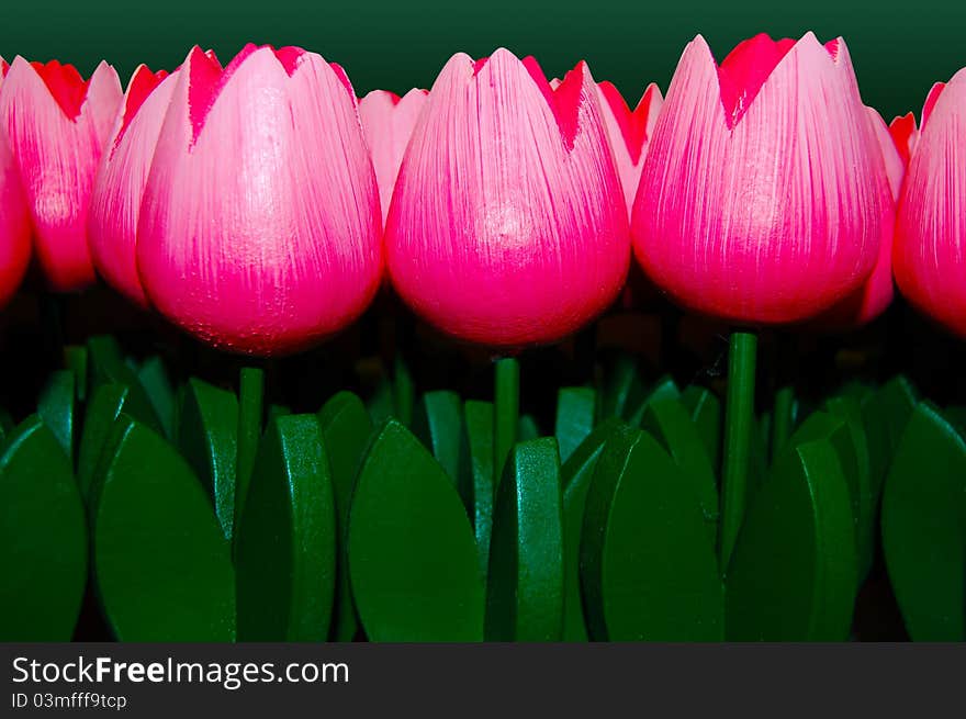 Set of pink wooden tulip ornaments. Set of pink wooden tulip ornaments.