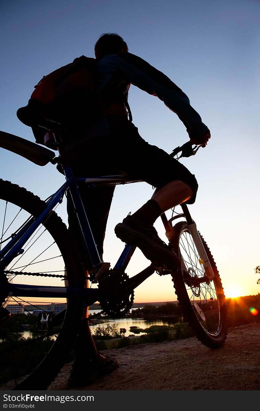 Silhouette of bicycle look on summer sunrise. Silhouette of bicycle look on summer sunrise