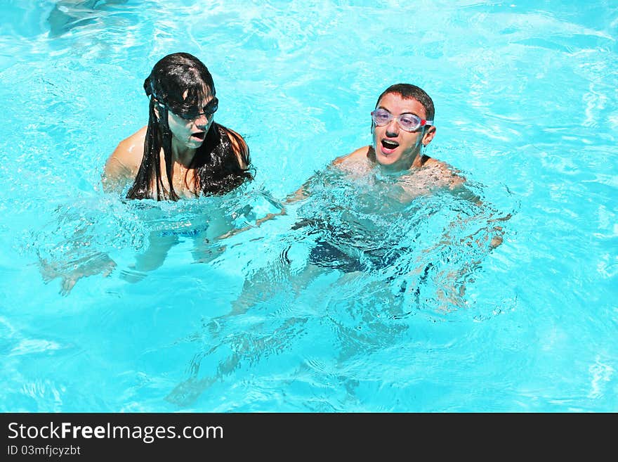 Couple in swimming pool