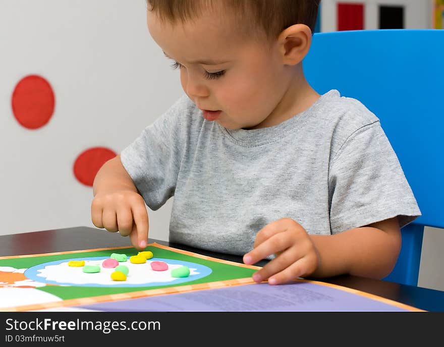 Boy and plasticine