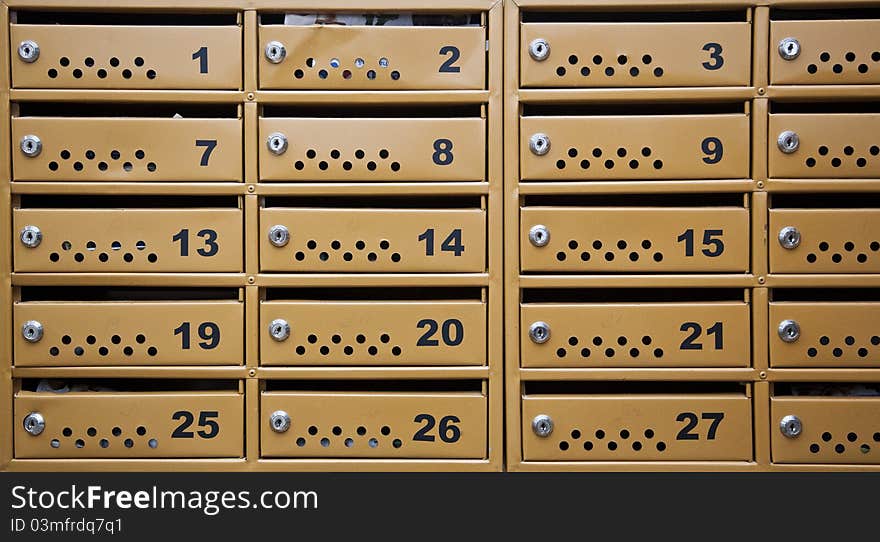 Many metal mailboxes with blank name tags