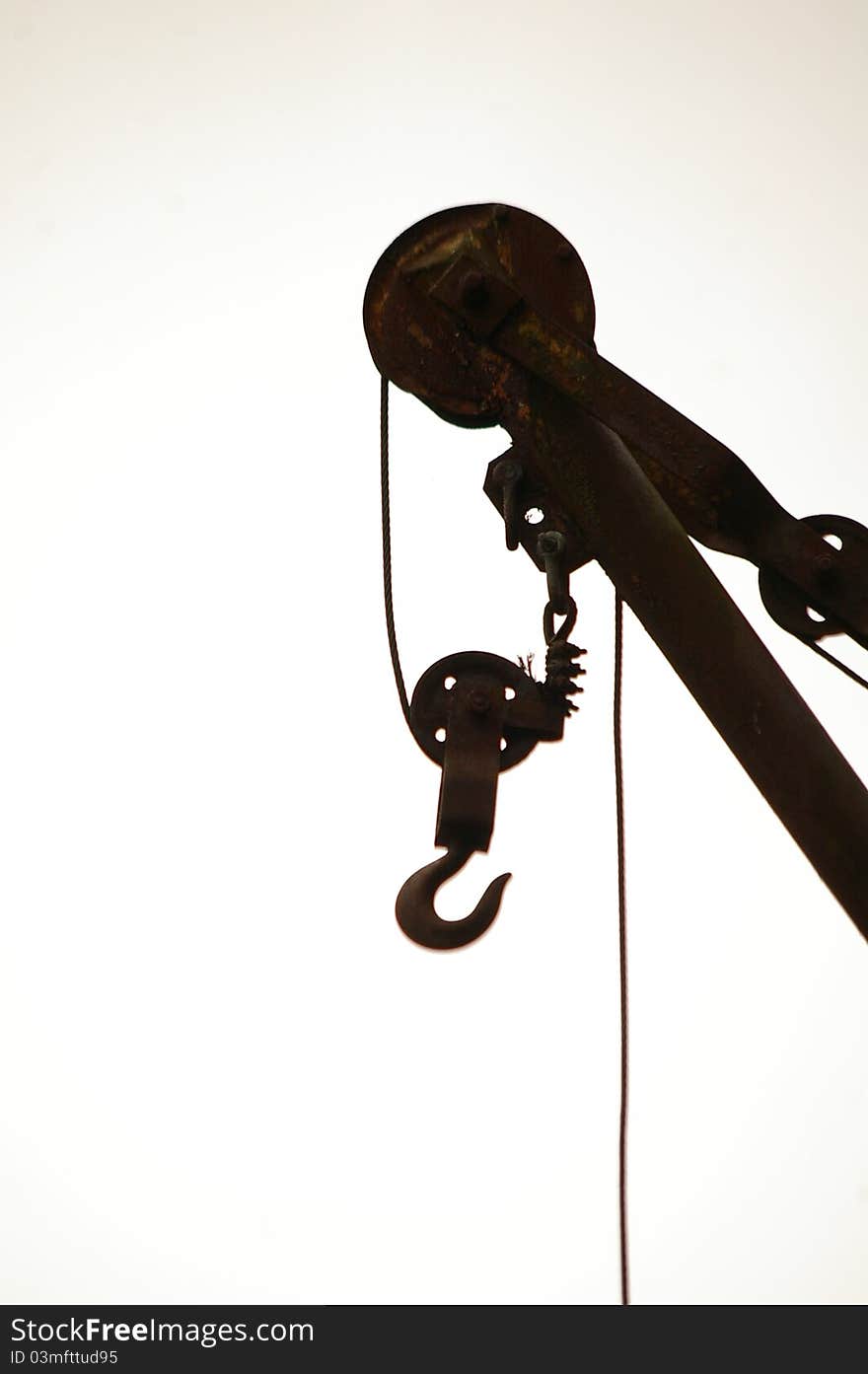 Silhouette of a crane on old background