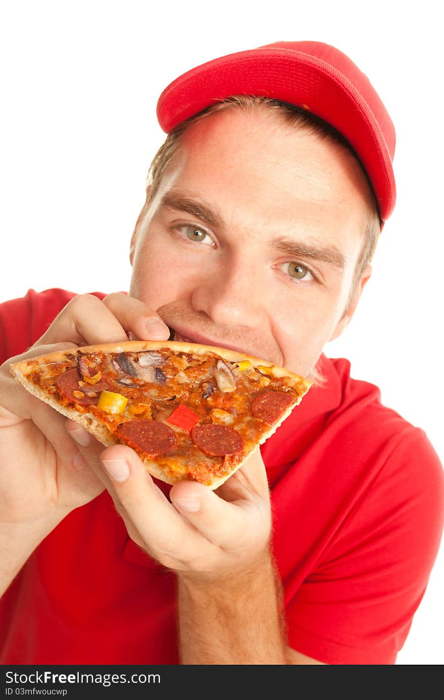 Eating a pizza isolated on white