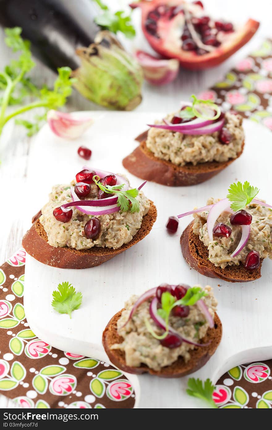 Aubergine caviar with onion,pomegranate and walnut