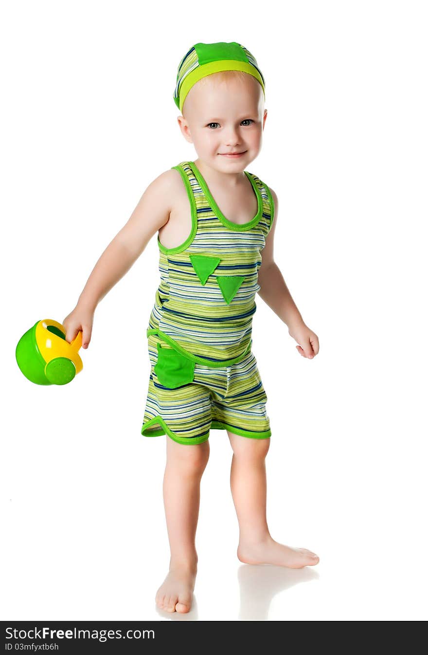 Little boy with a watering can on a white background