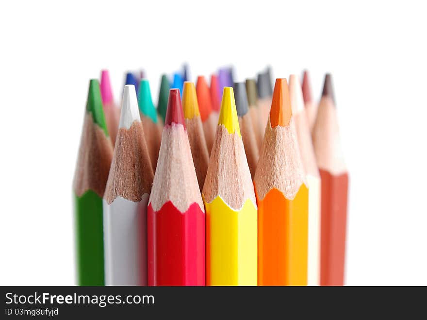 Close view of colored pencils, isolated on a white background. Close view of colored pencils, isolated on a white background