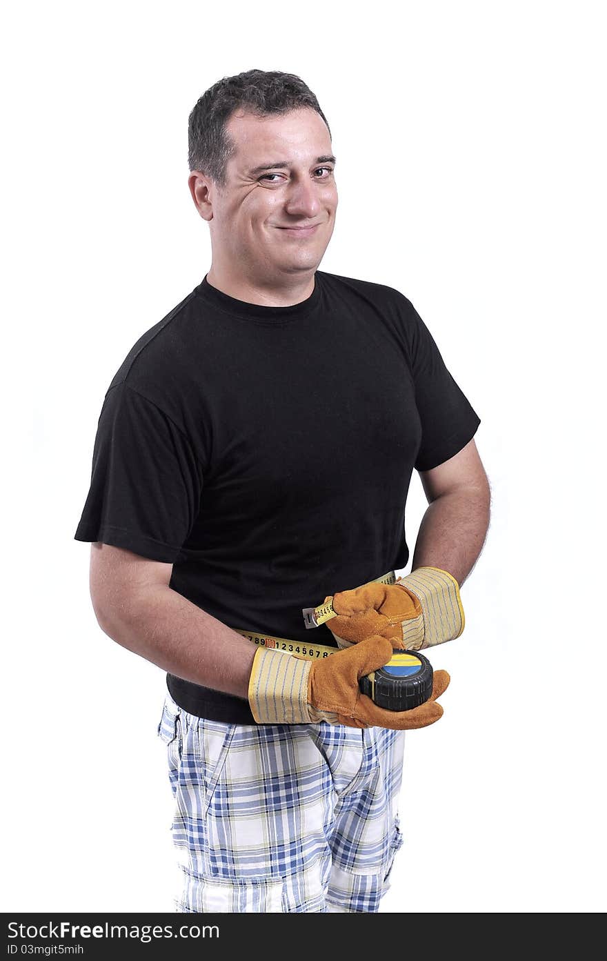 Man with a tape measure measuring his waist