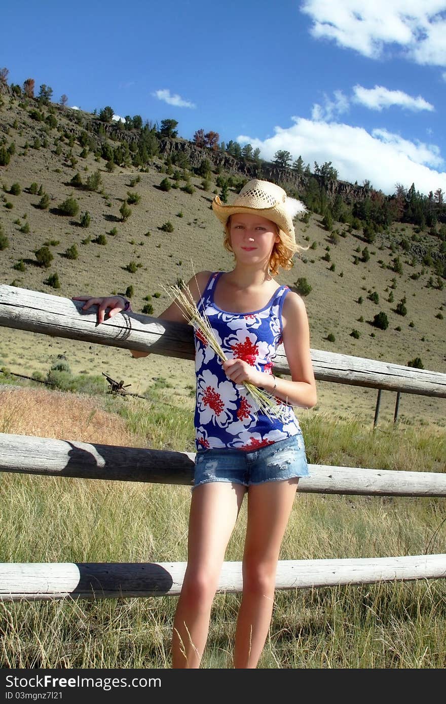 Happy young cowgirl