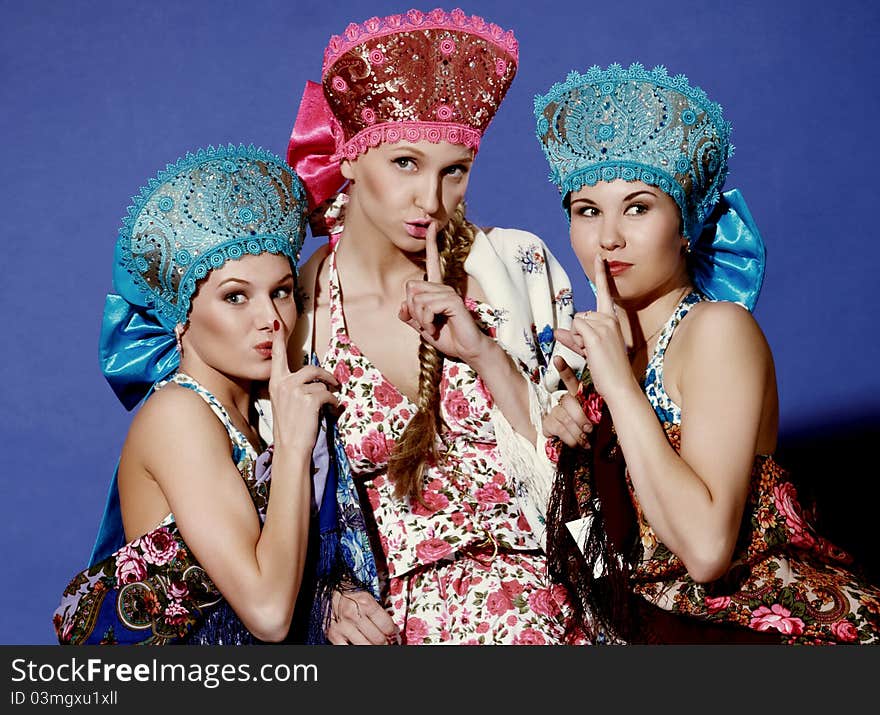 Three girls in traditional dress