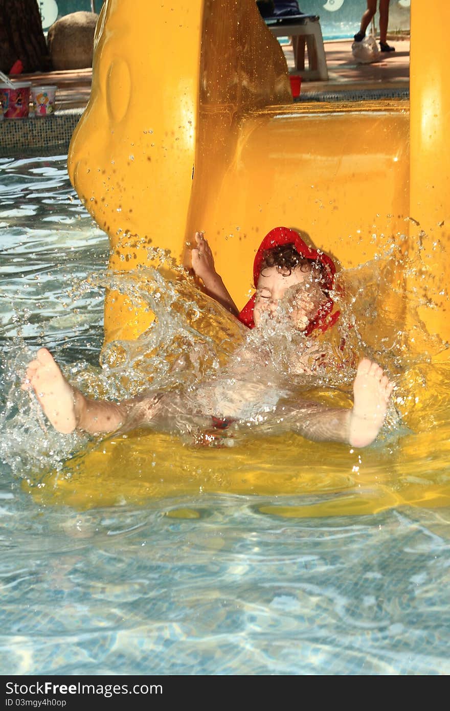 Child on water slide