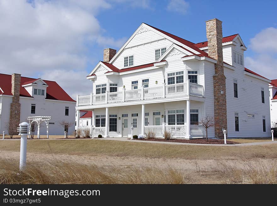 A multi-unit townhome building with balconies. A multi-unit townhome building with balconies.