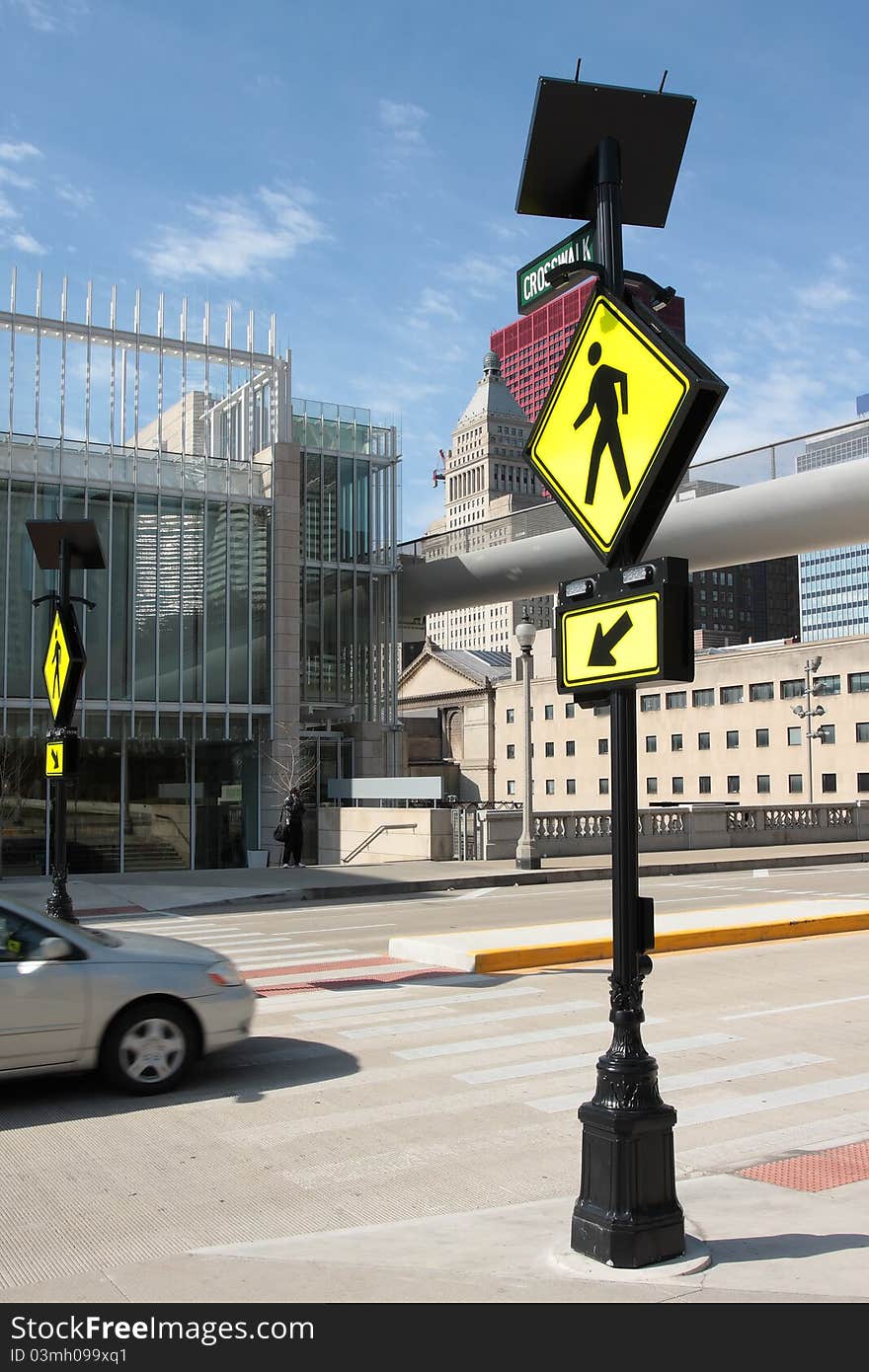 Pedestrian Crossing Sign In A Downtown Area