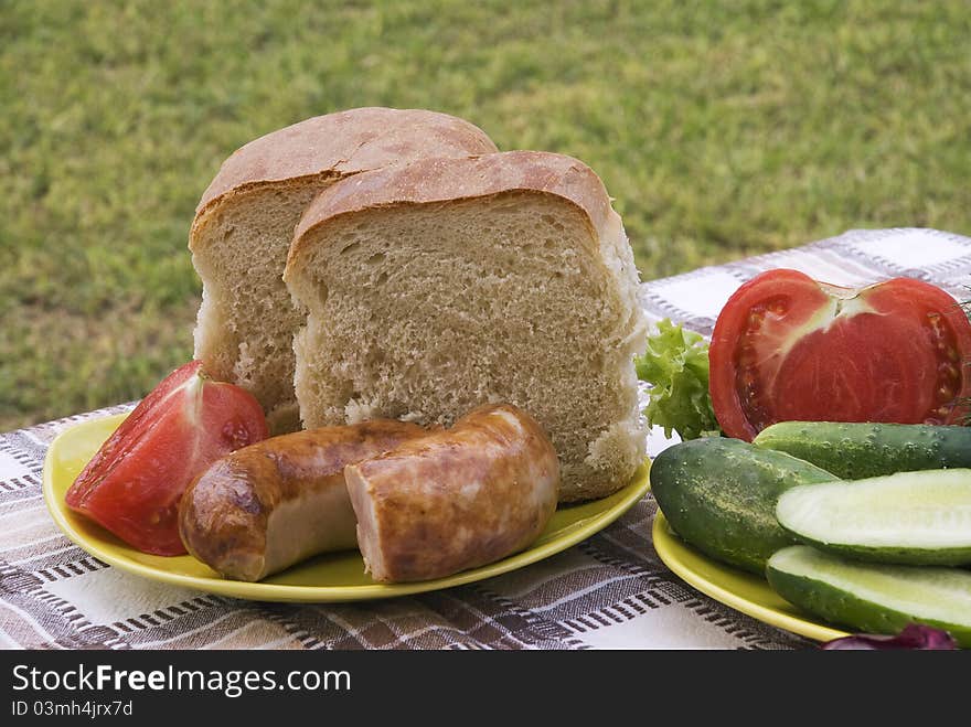 Summer dinner on table in garden