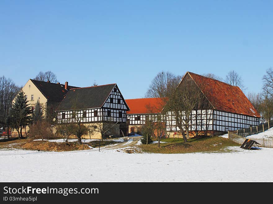 Traditional farm house in winter