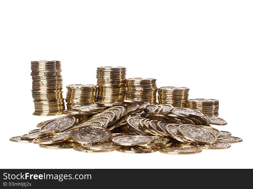 Pile of golden coins and stacks in the back isolated on a white background. Pile of golden coins and stacks in the back isolated on a white background.