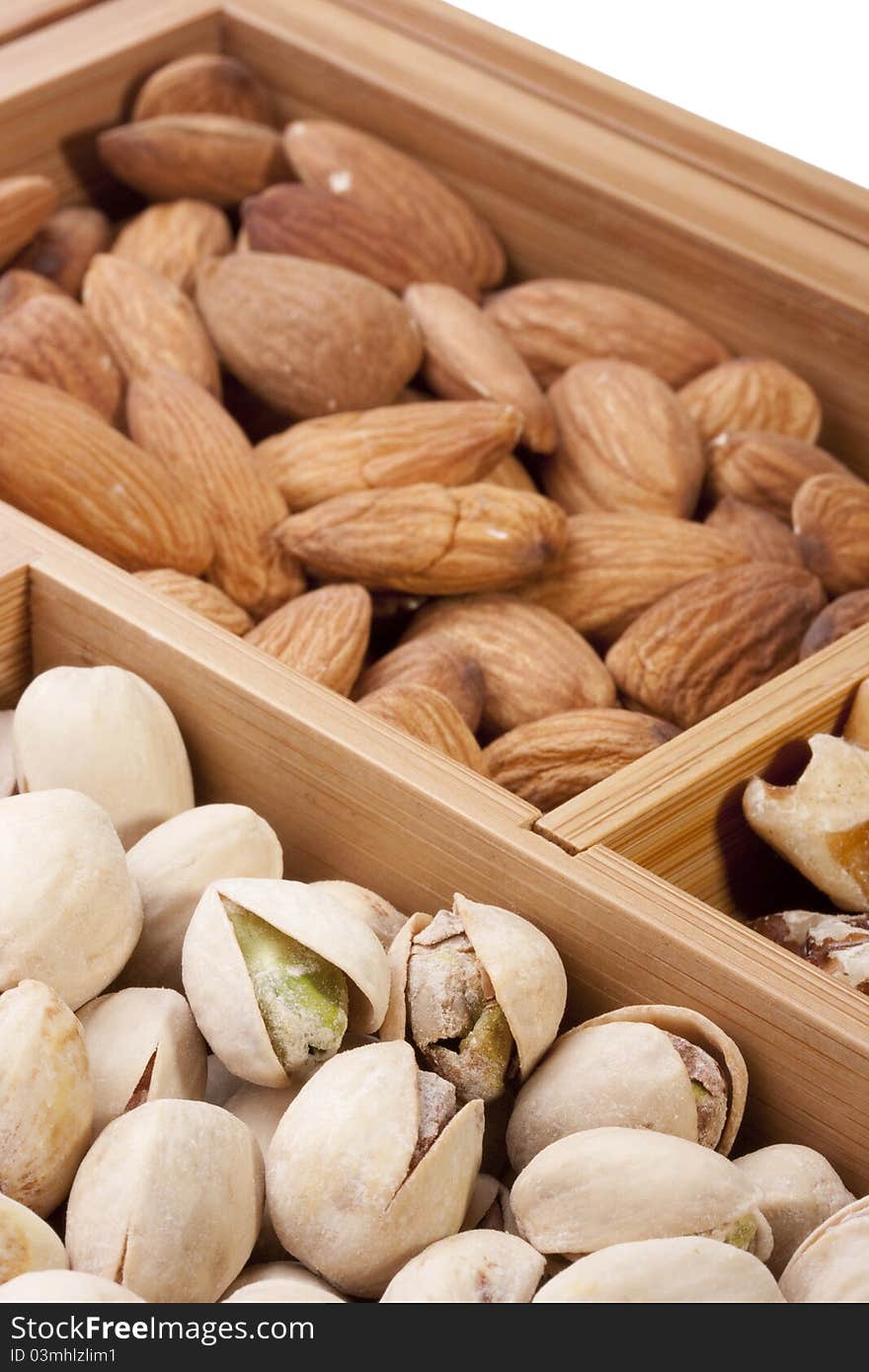 Nuts of different grades in a wooden box.