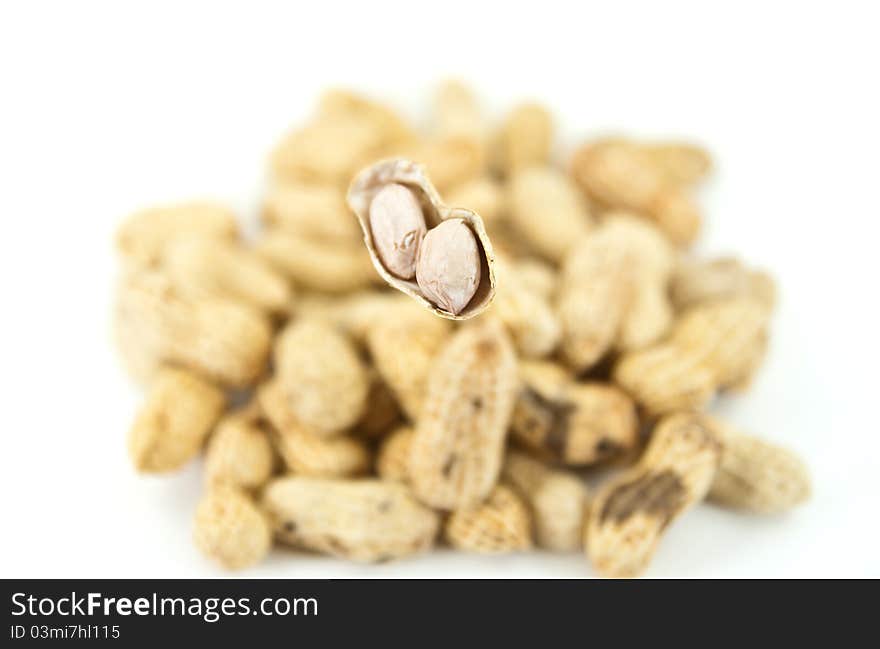 Close up peanuts with white background.