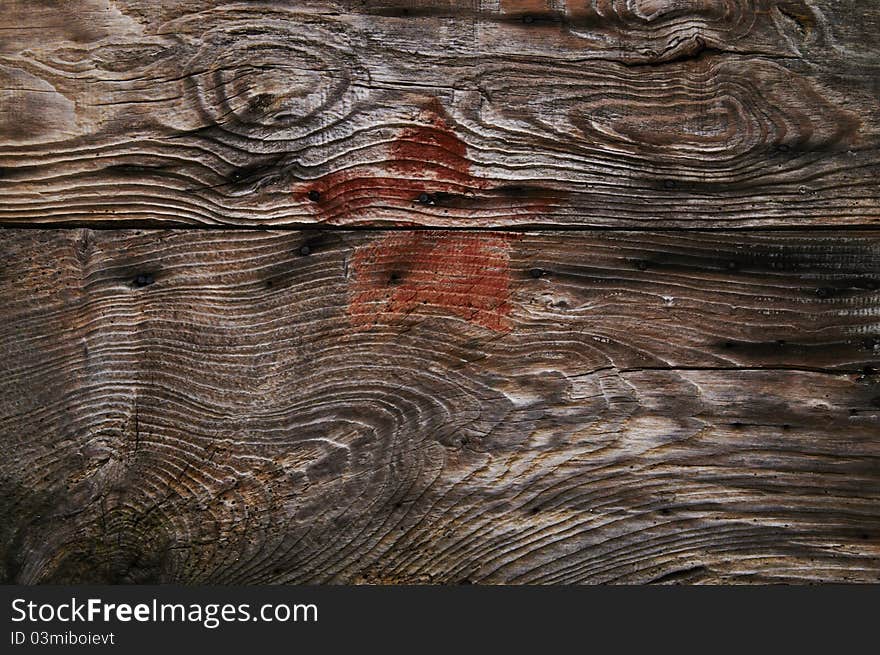 Red star painted on the wooden wall of the building