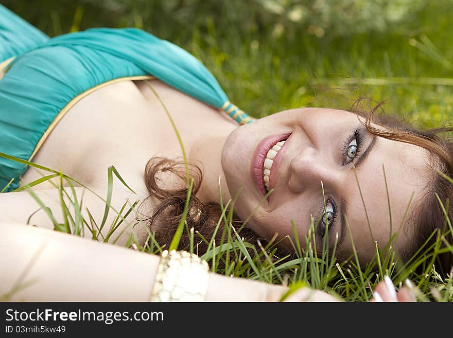 Extraordinarily beautiful girl in a blue dress