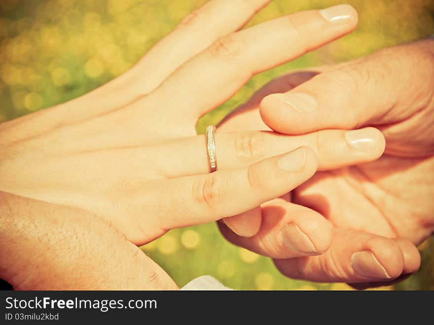 The moment of exchanging the wedding bands