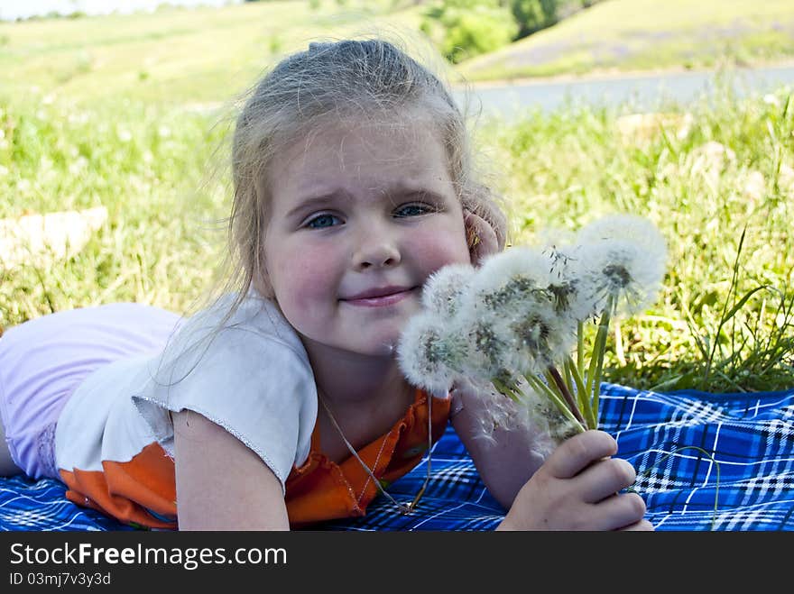 The Girl With Dandelions