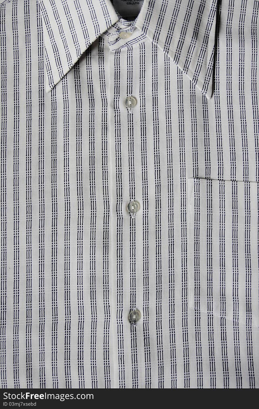 Detail of white cotton men shirt. Detail of white cotton men shirt