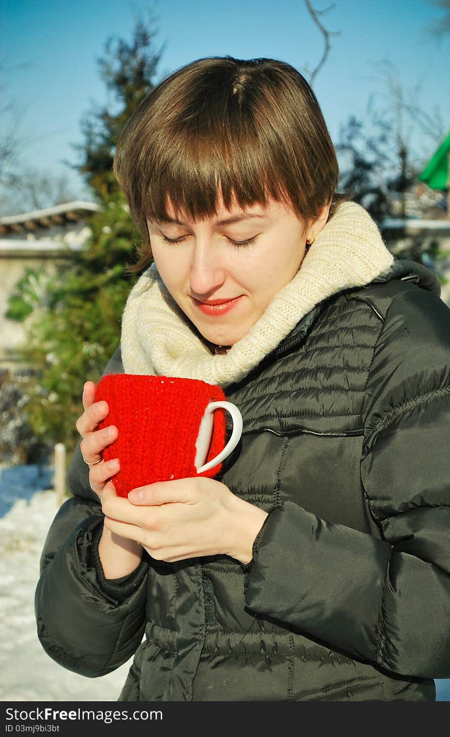 Young Woman Drinking Hot Tea Outdoors