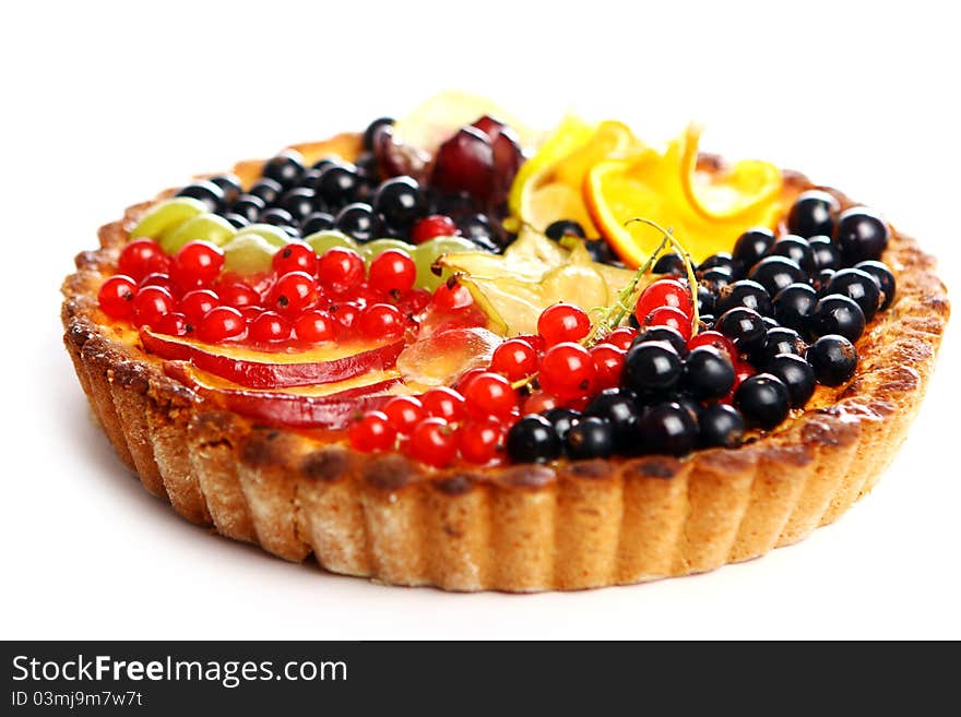 Tasty fruitcake on white background