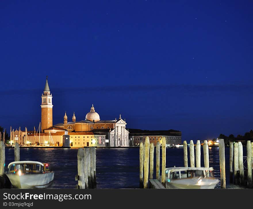 Waiting for the sunset and the blue hour near the Piazza San Marco, Venice, I took this shot of the church of San Giorgio Maggiore and the boats. San Giorgio Maggiore is a 16th century Benedictine church on the island of the same name in Venice. The church is a basilica in the classical renaissance style and its brilliant white marble gleams above the blue water and sky. Waiting for the sunset and the blue hour near the Piazza San Marco, Venice, I took this shot of the church of San Giorgio Maggiore and the boats. San Giorgio Maggiore is a 16th century Benedictine church on the island of the same name in Venice. The church is a basilica in the classical renaissance style and its brilliant white marble gleams above the blue water and sky.