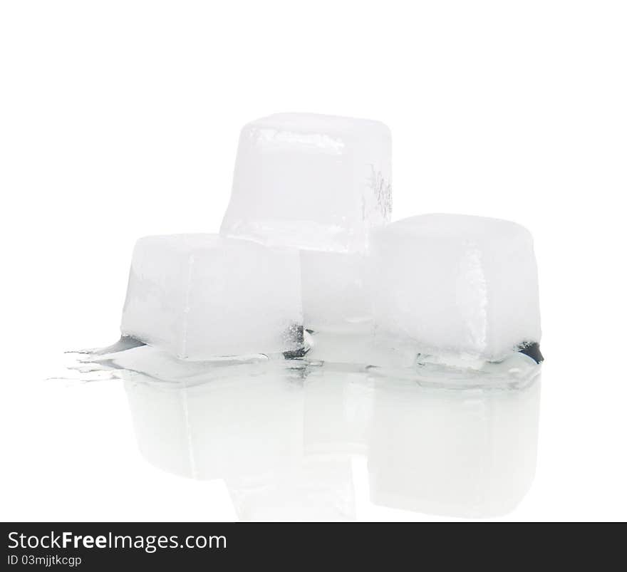 Ice cubes with reflection isolated on white