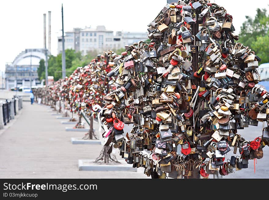 Colorful wedding padlocks at a wedding tree