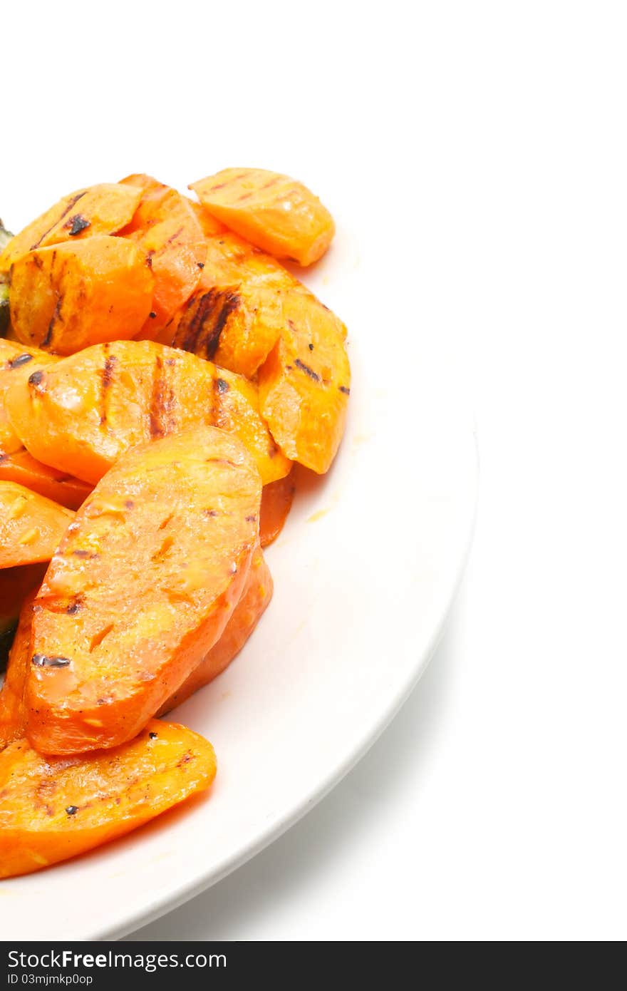 Grilled carrot on а plate