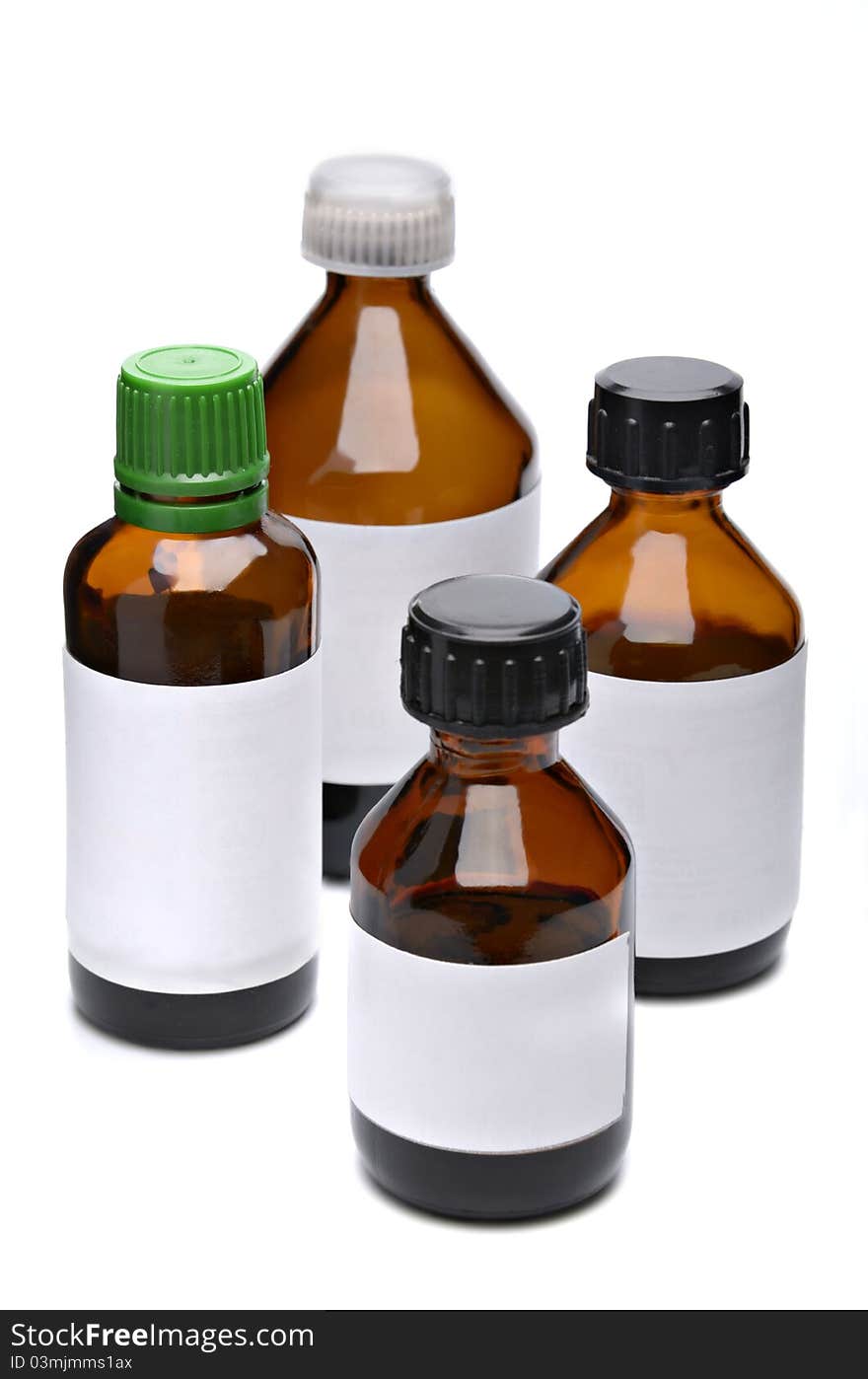 Liquid medicine in glass bottle on white background. Liquid medicine in glass bottle on white background