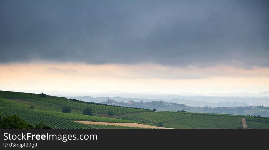 Italian landscape (Isola d'Asti, Asti, piedmont, Italy) with storm sky. Italian landscape (Isola d'Asti, Asti, piedmont, Italy) with storm sky.