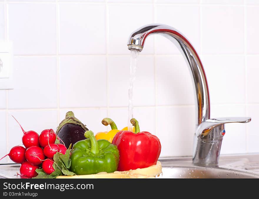 Fresh vegetables in the sink