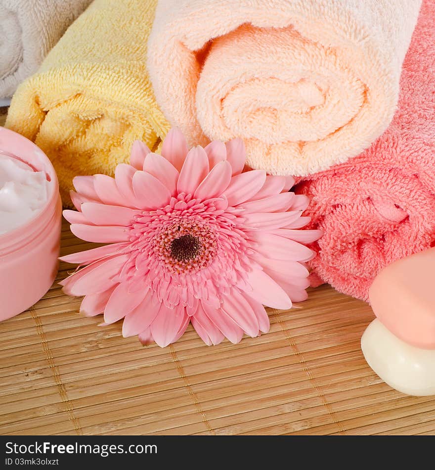 Pink Gerbera And A Towel