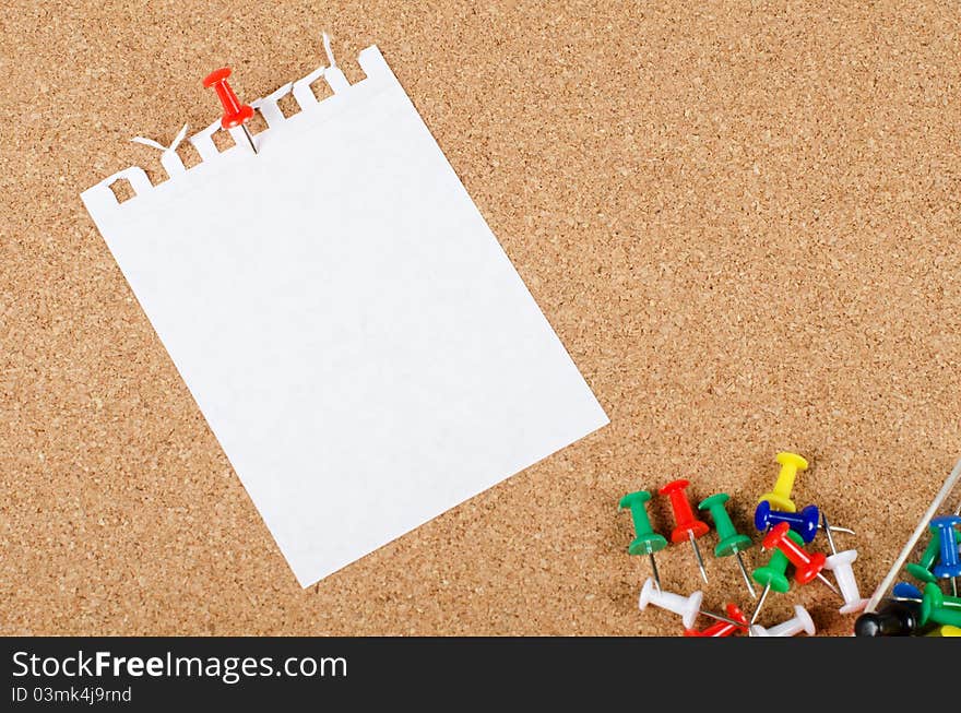 The collection of note papers on corkboard background