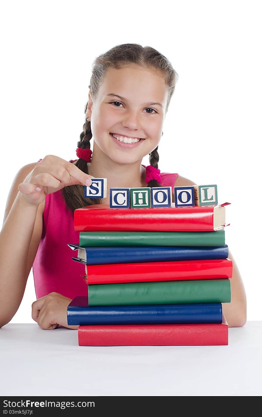 Portrait of the young girl with books