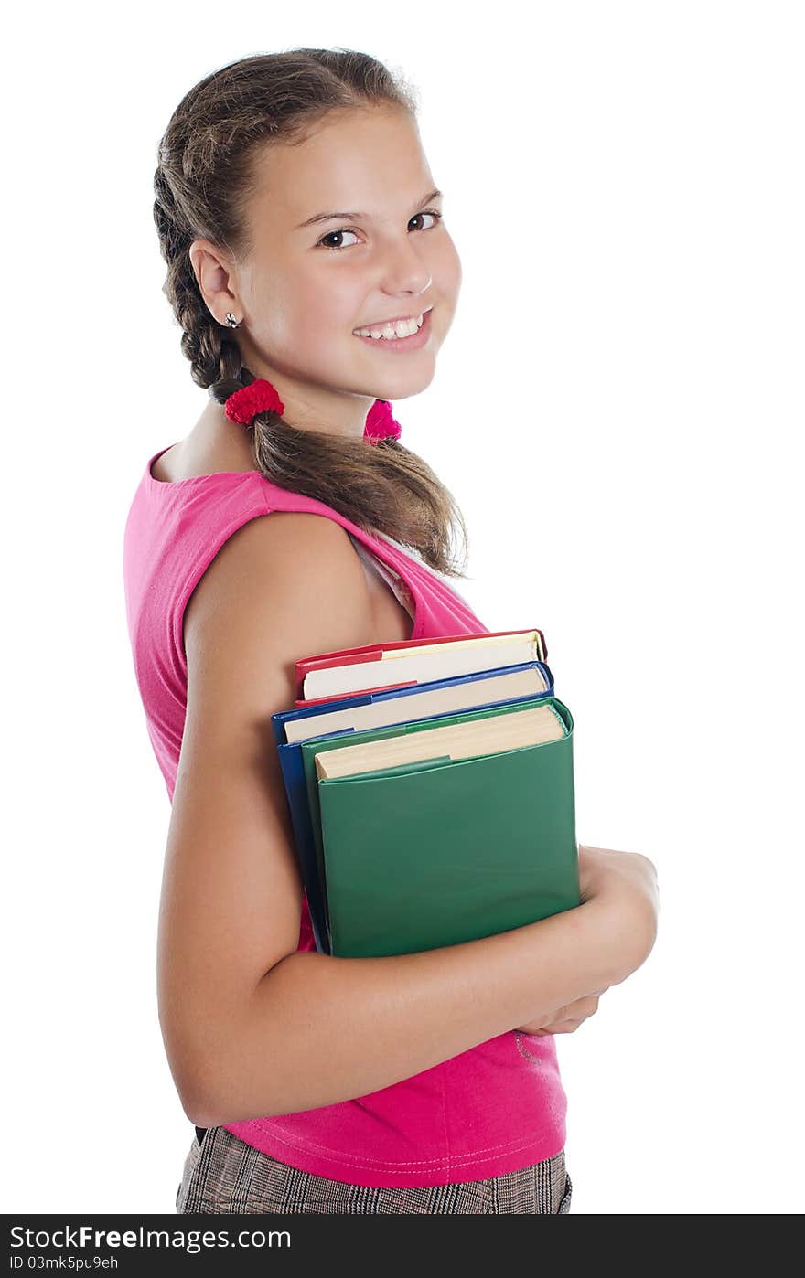 Portrait of the young girl with books