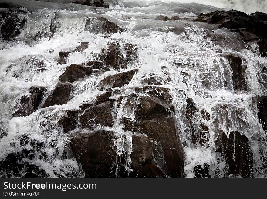 Closeup of falling water. Gullfoss (Golden waterfall), Iceland