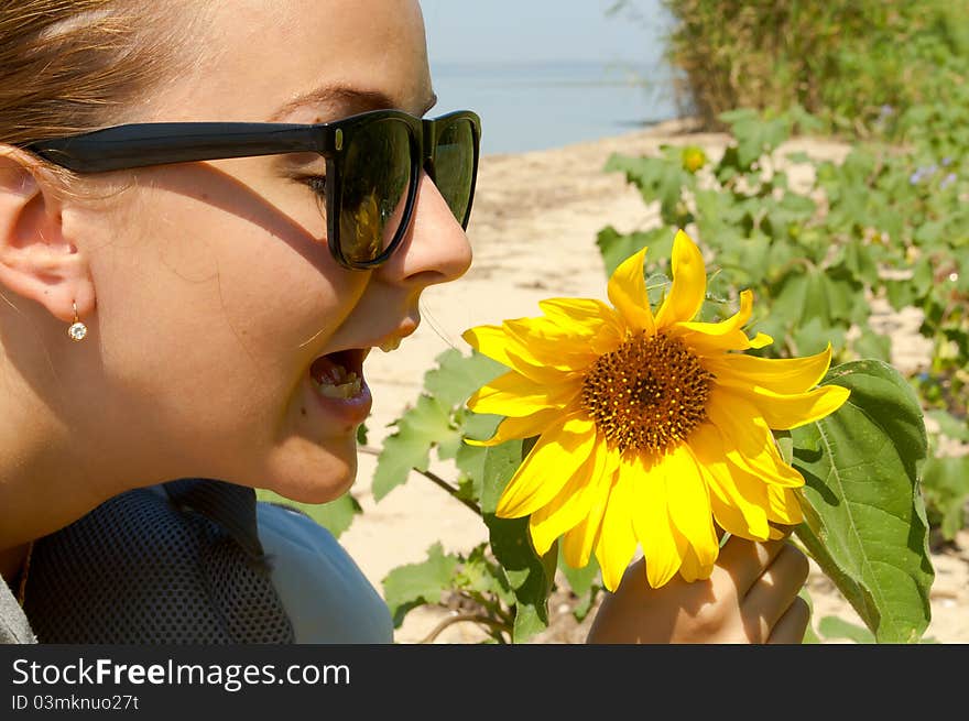 The girl and a sunflower