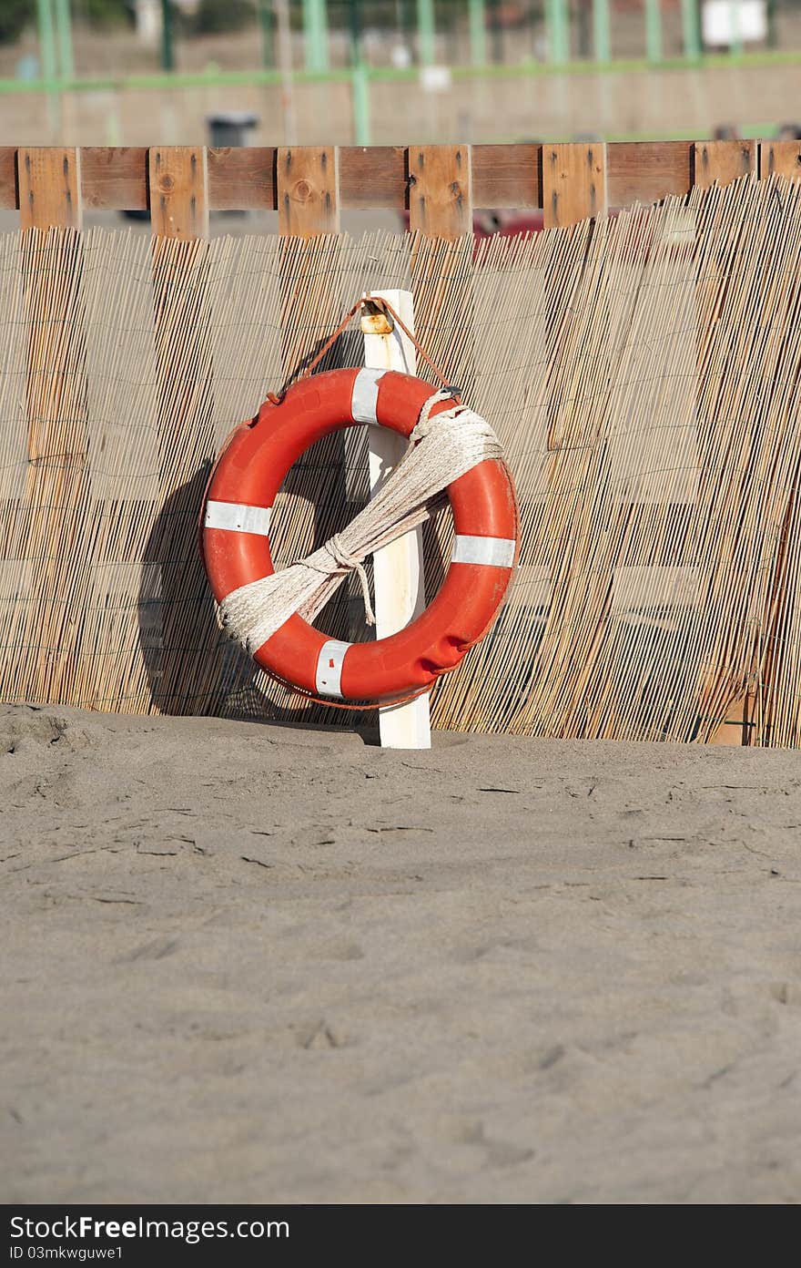 Close up of lifesaver on the beach