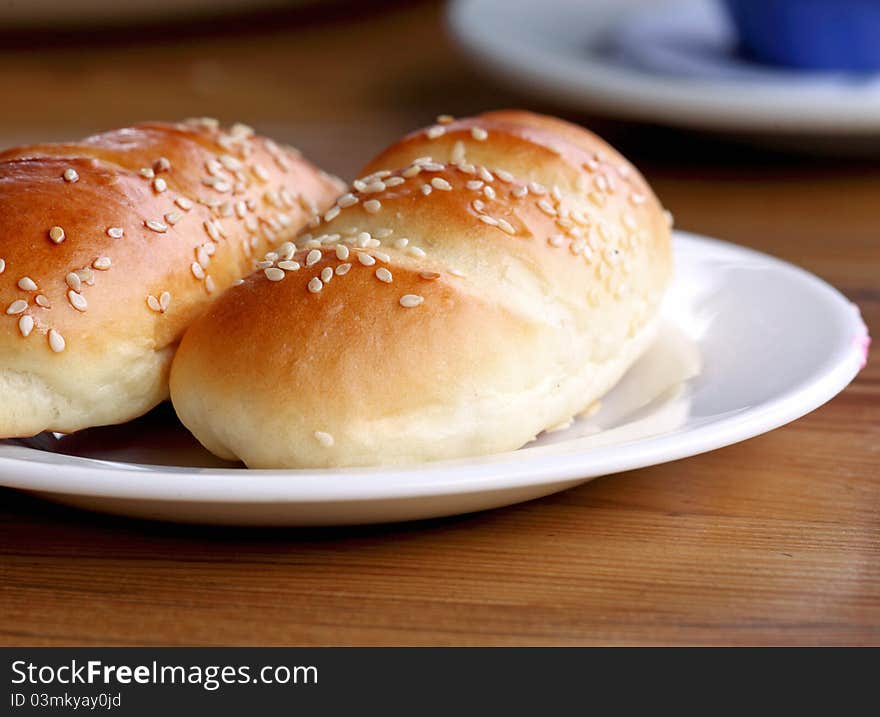 A bread and coffee on the table