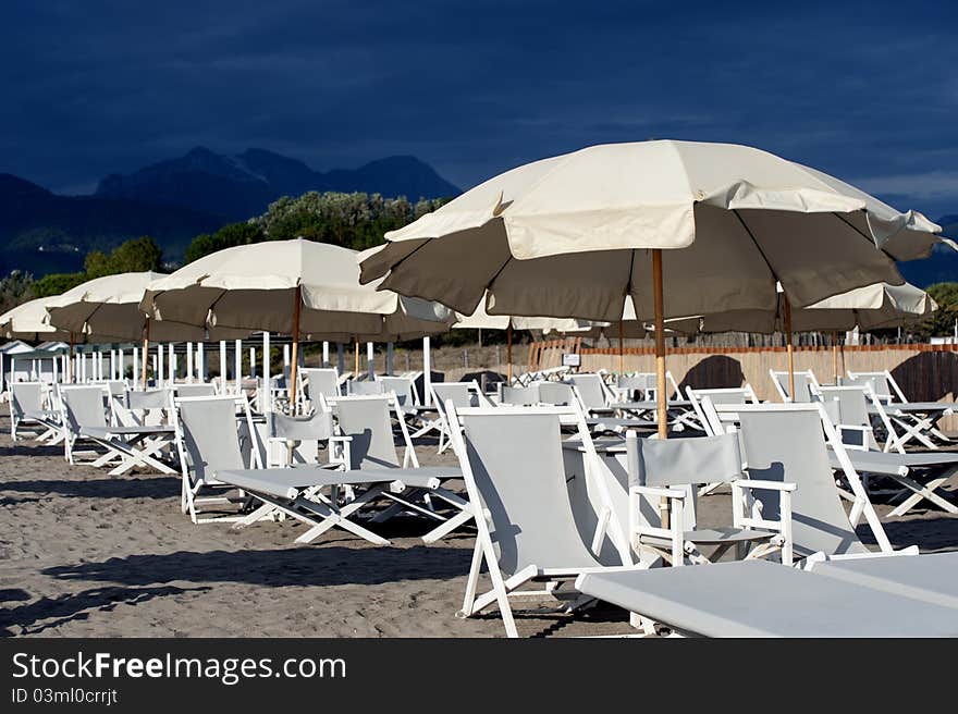 Beach chair and umbrella on the beach