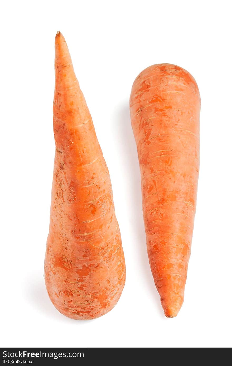 Two carrots set in different dimensions isolated on white