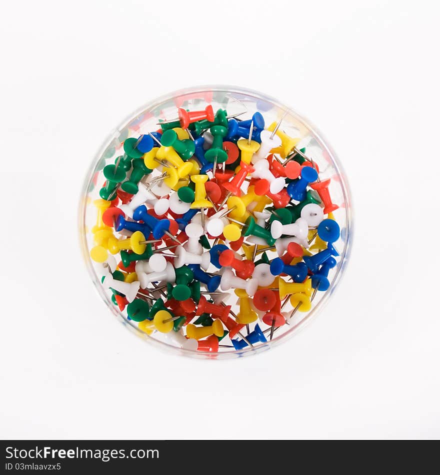 Multi Colored Push Pins on a White Background