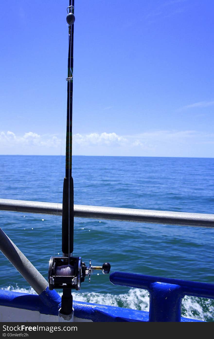 Picture of a fishing pole on a fishing boat. Picture of a fishing pole on a fishing boat