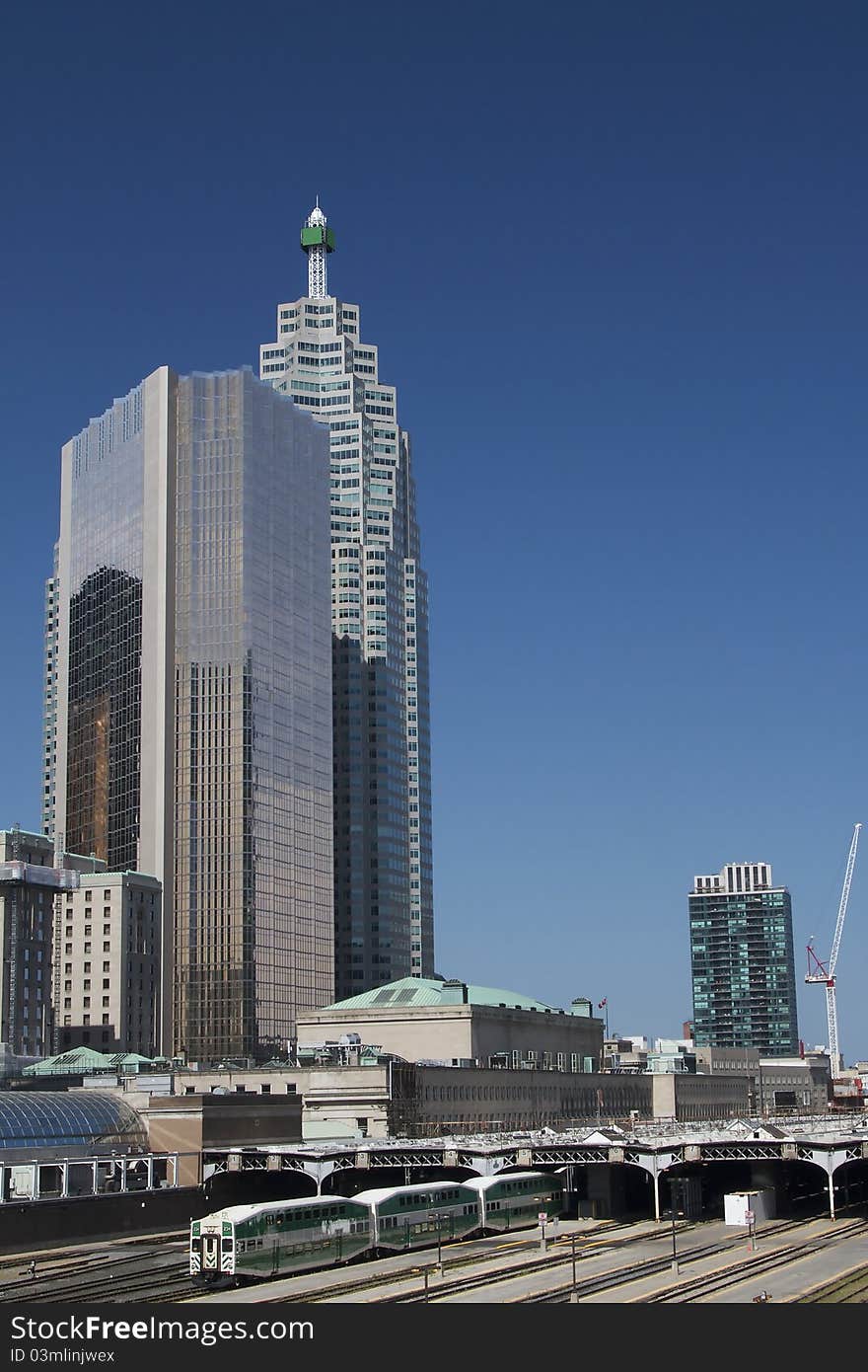 A train station with office towers at the background in Toronto